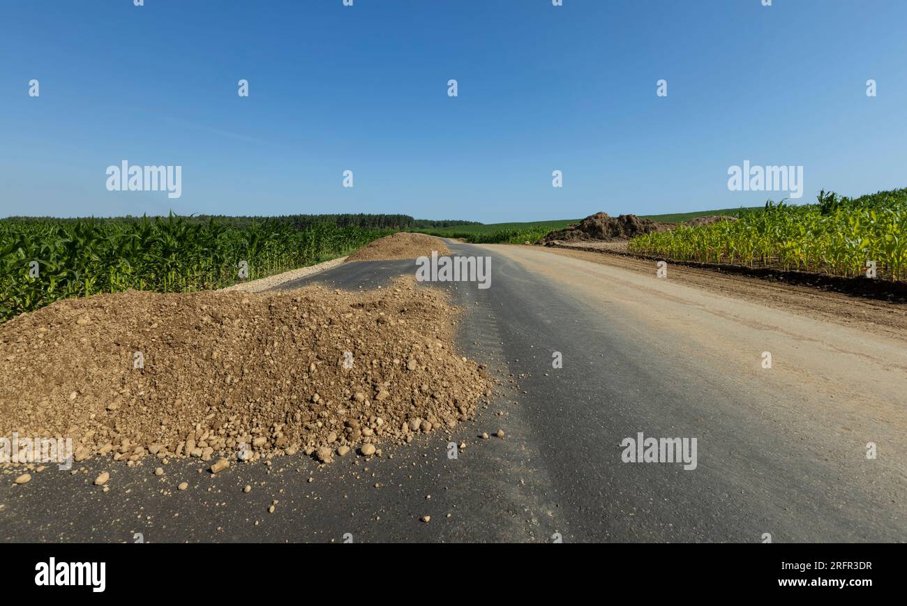 Local Roads Making Construction and repair of a new highway in rural areas, a narrow paved ...