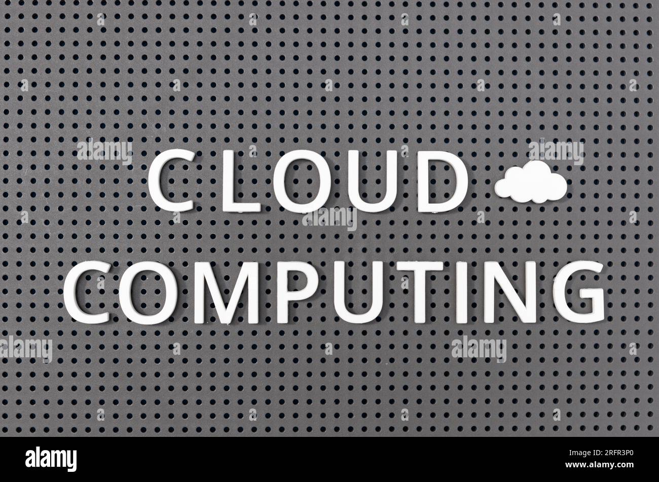 Cloud computing concept. Plastic letters message on gray board Stock Photo