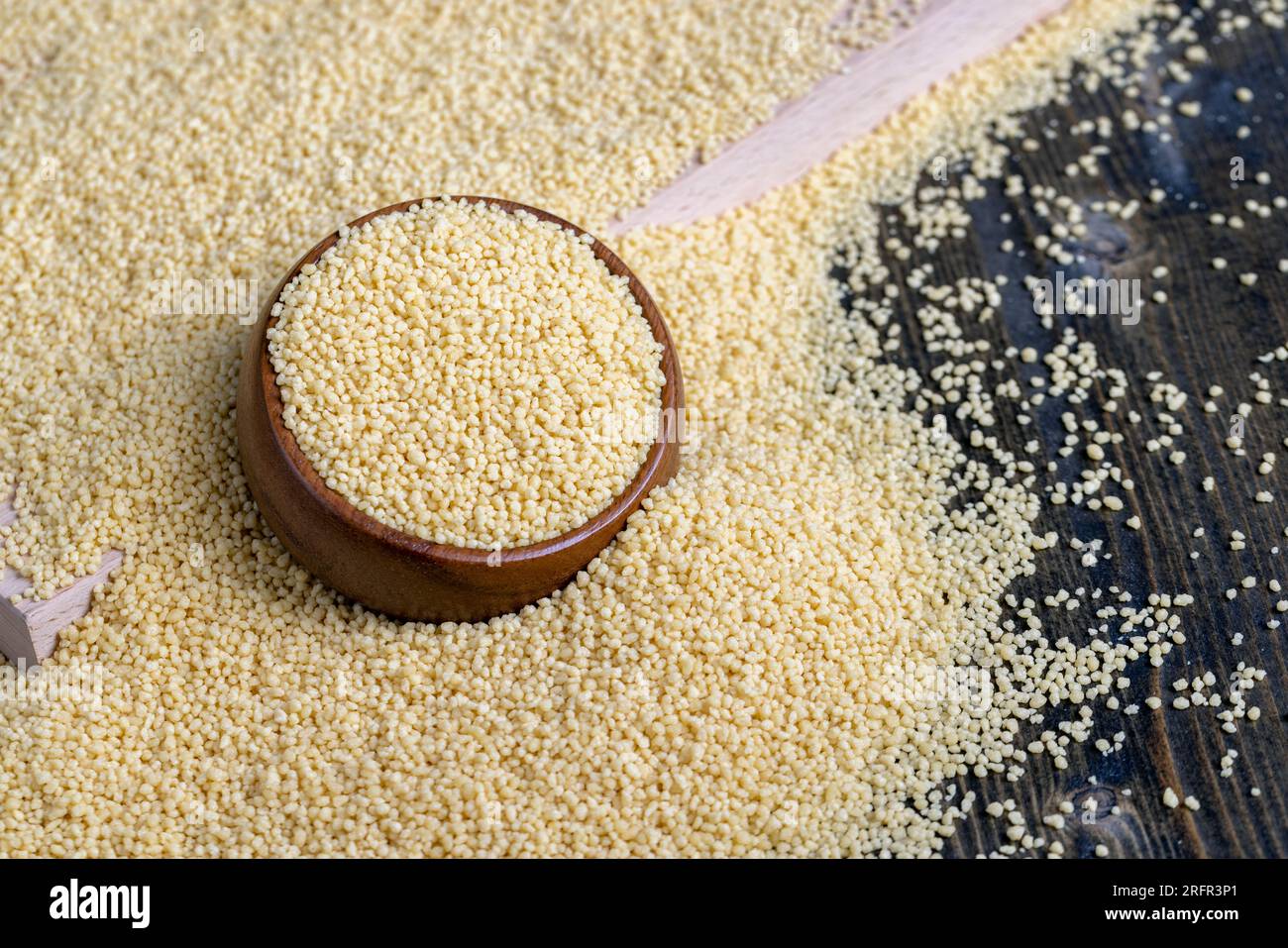 Fresh raw porridge couscous from wheat or millet, cooking dishes from traditional cereals of