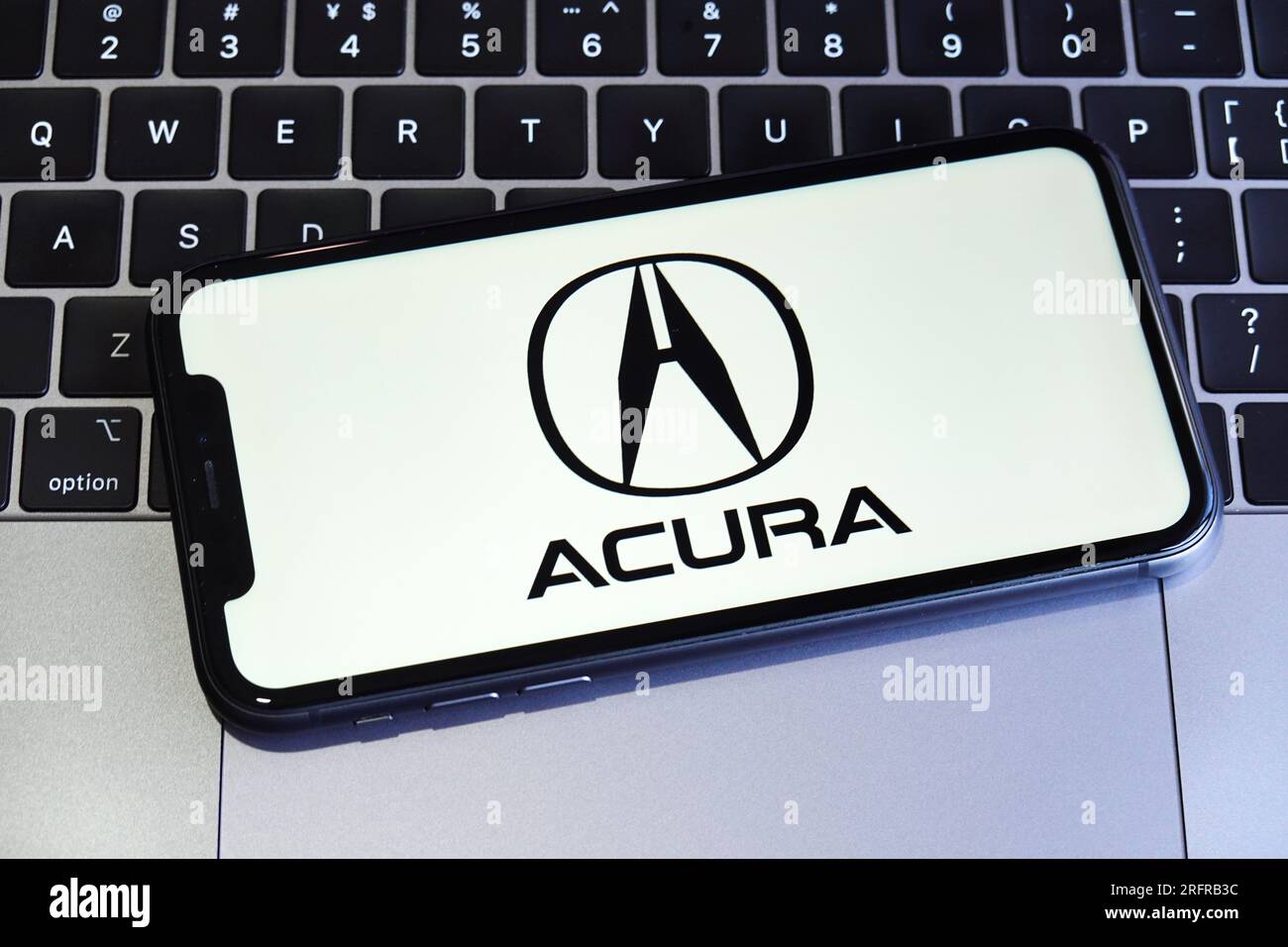 China. 05th Aug, 2023. In this photo illustration, the Acura logo is displayed on the screen of a smartphone in China. Acura is a luxury automaking brand, launched by the Japanese Honda in the middle of the 1980s. The company was established in North America, and today operates all over the globe, exporting high-end sedans and SUVs to all continents. Credit: SOPA Images Limited/Alamy Live News Stock Photo