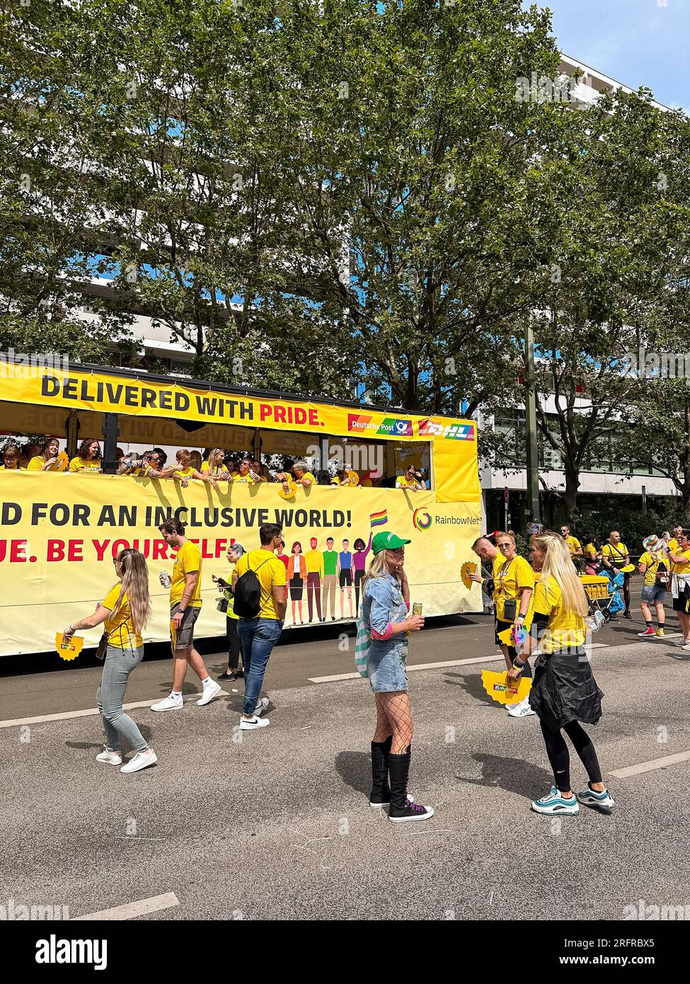 BERLIN, GERMANY – JULY 22, 2023:The Berlin Pride Celebration also known as Christopher Street Day (CSD) in Berlin. Float of DHL company. Stock Photo