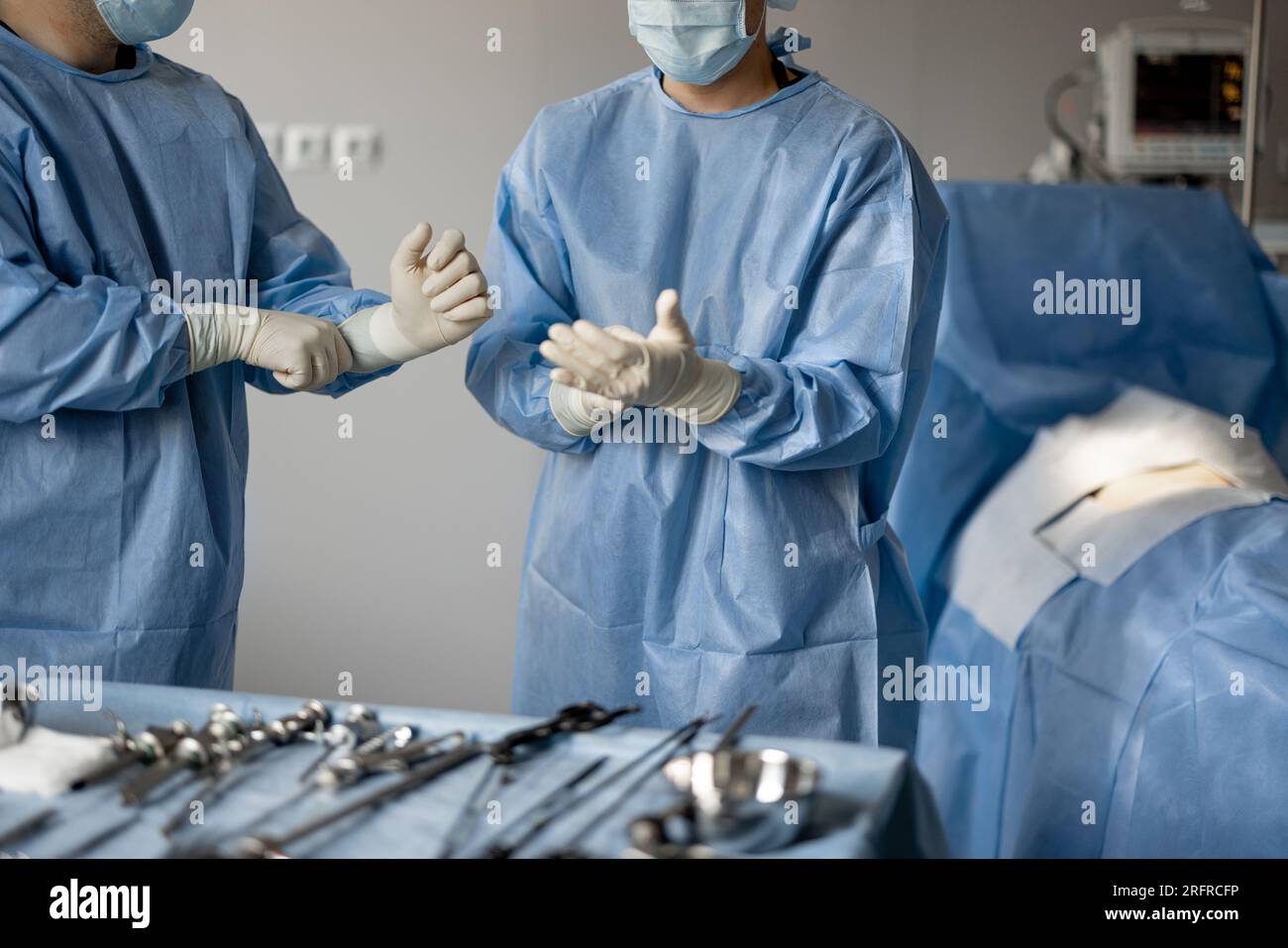 Surgeons prepare sterile medical instruments for surgery Stock Photo ...