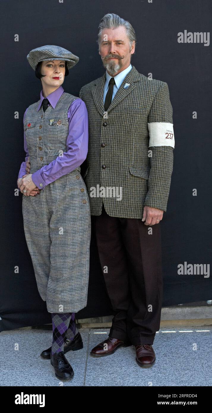 A tweed-dressed couple poses at the Tweed Run, London, UK Stock Photo