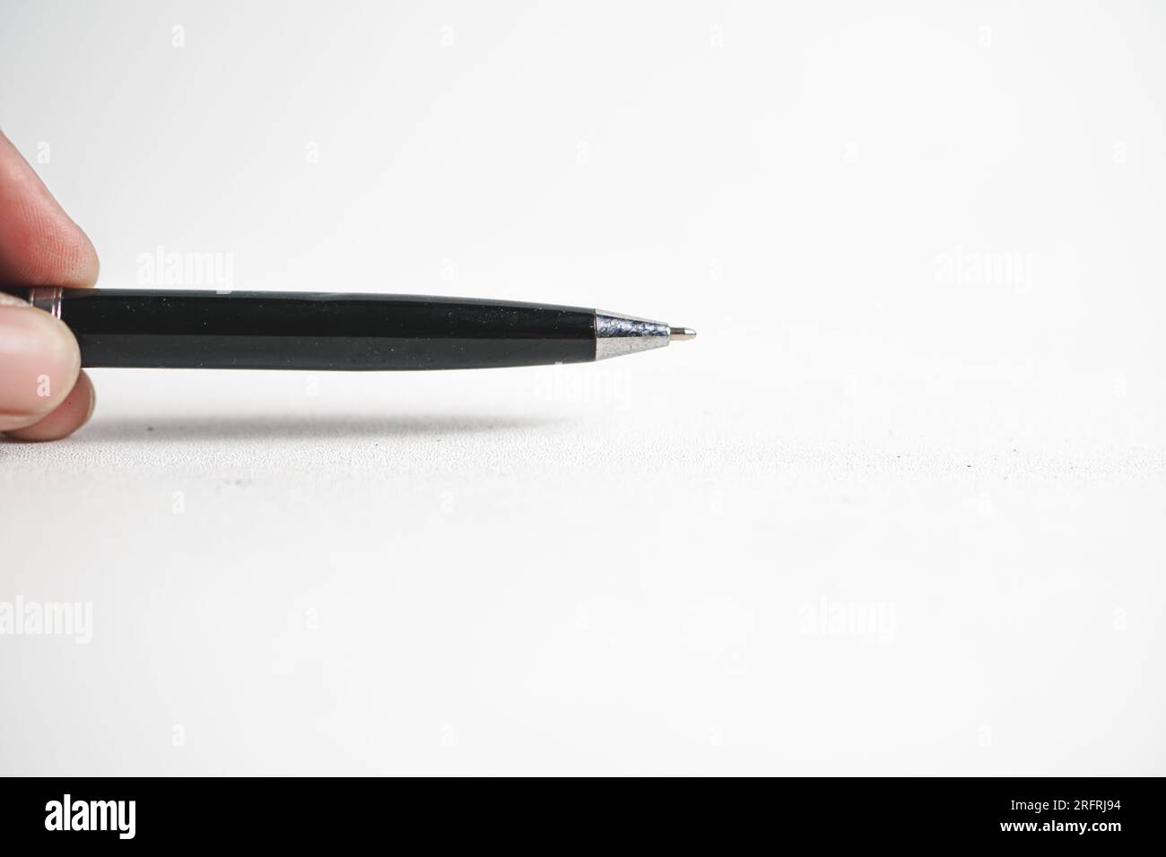 Woman thinking with pen pencil hi-res stock photography and images - Alamy
