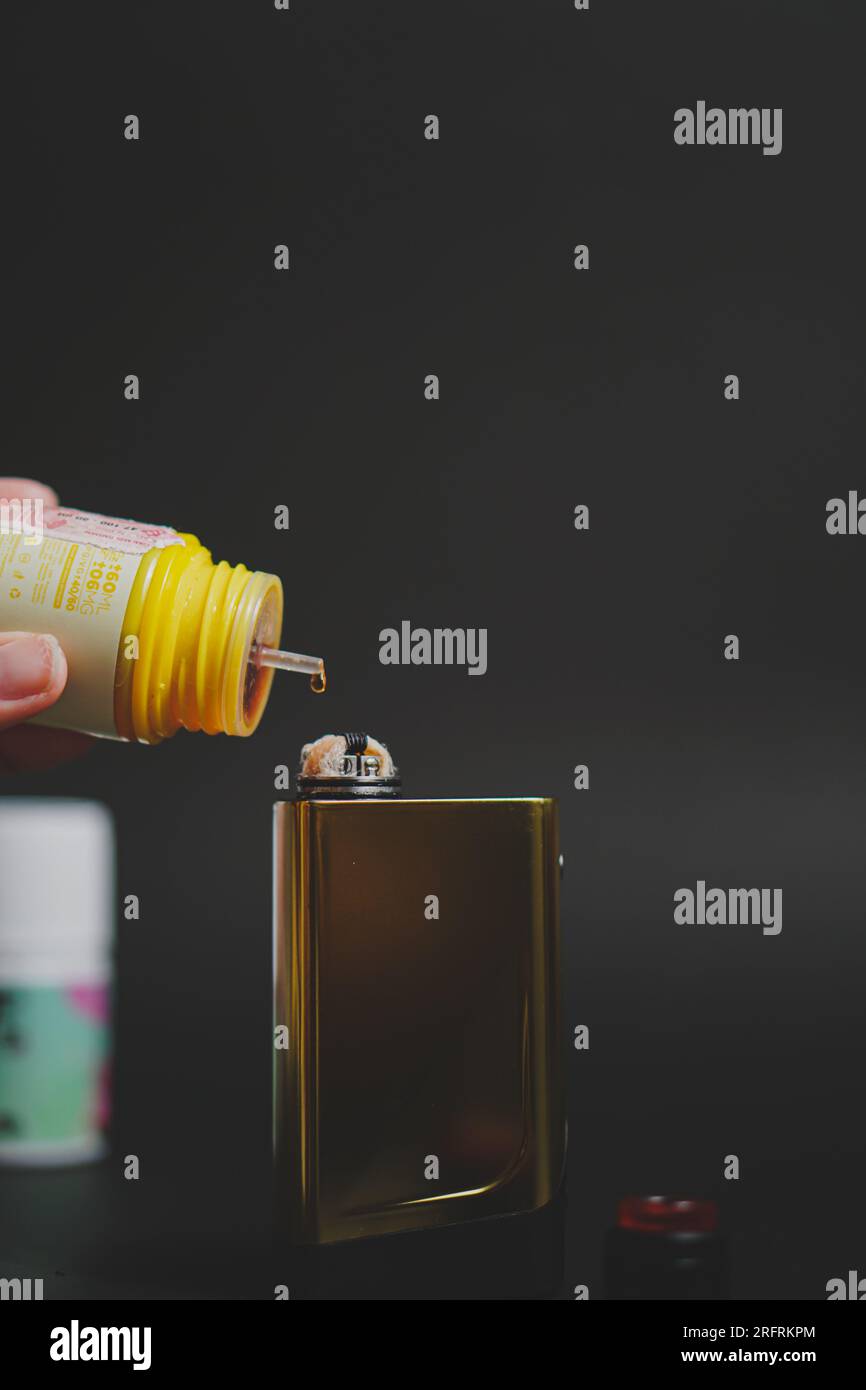 Top-up liquid smoking electronic cigarettes. Vape smoke. Electronic cigarettes. Vaping oil. Vaping juice bottles Stock Photo - Alamy Top-up liquid smoking electronic cigarettes. Vape smoke. Electronic cigarettes. Vaping oil. Vaping juice bottles Stock Photo - Alamy