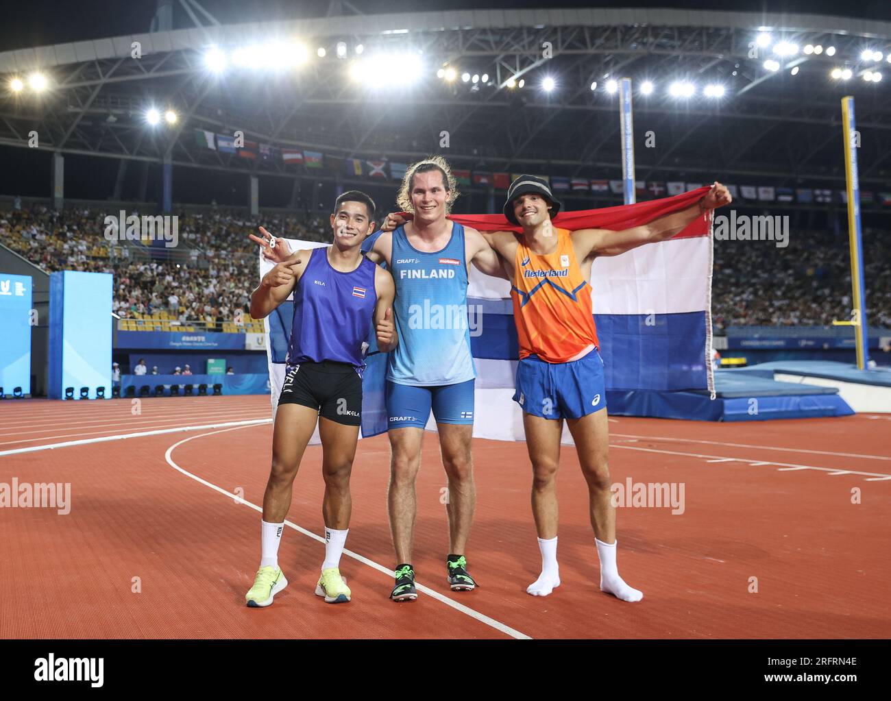 Chengdu, China's Sichuan Province. 5th Aug, 2023. Gold medalist Urho Vaino Johannes Kujanpaa (C) of Finland, silver medalist Patsapong Amsamarng (L) of Thailand and bronze medalist Koen Evan Van Der Wijst of the Netherlands celebrate after the athletics men's pole vault final at the 31st FISU Summer World University Games in Chengdu, southwest China's Sichuan Province, Aug. 5, 2023. Credit: Li Jing/Xinhua/Alamy Live News Stock Photo