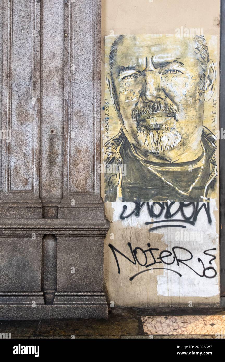 Charcoal and tempera portrait dedicated to rock singer Vasco Rossi by the street artist John Sale, under the arcades of Piazza Castello, Turin, Italy Stock Photo