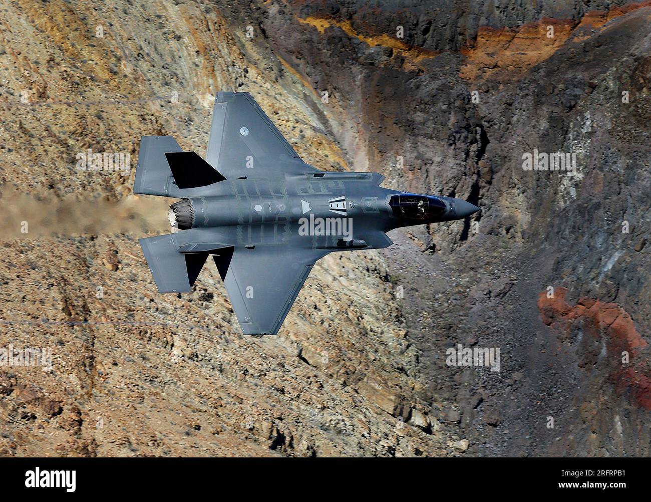 Lockheed Martin F-35 Lightning II passes through Jedi transition in Rainbow Canyon near Death Valley National Park. Stock Photo