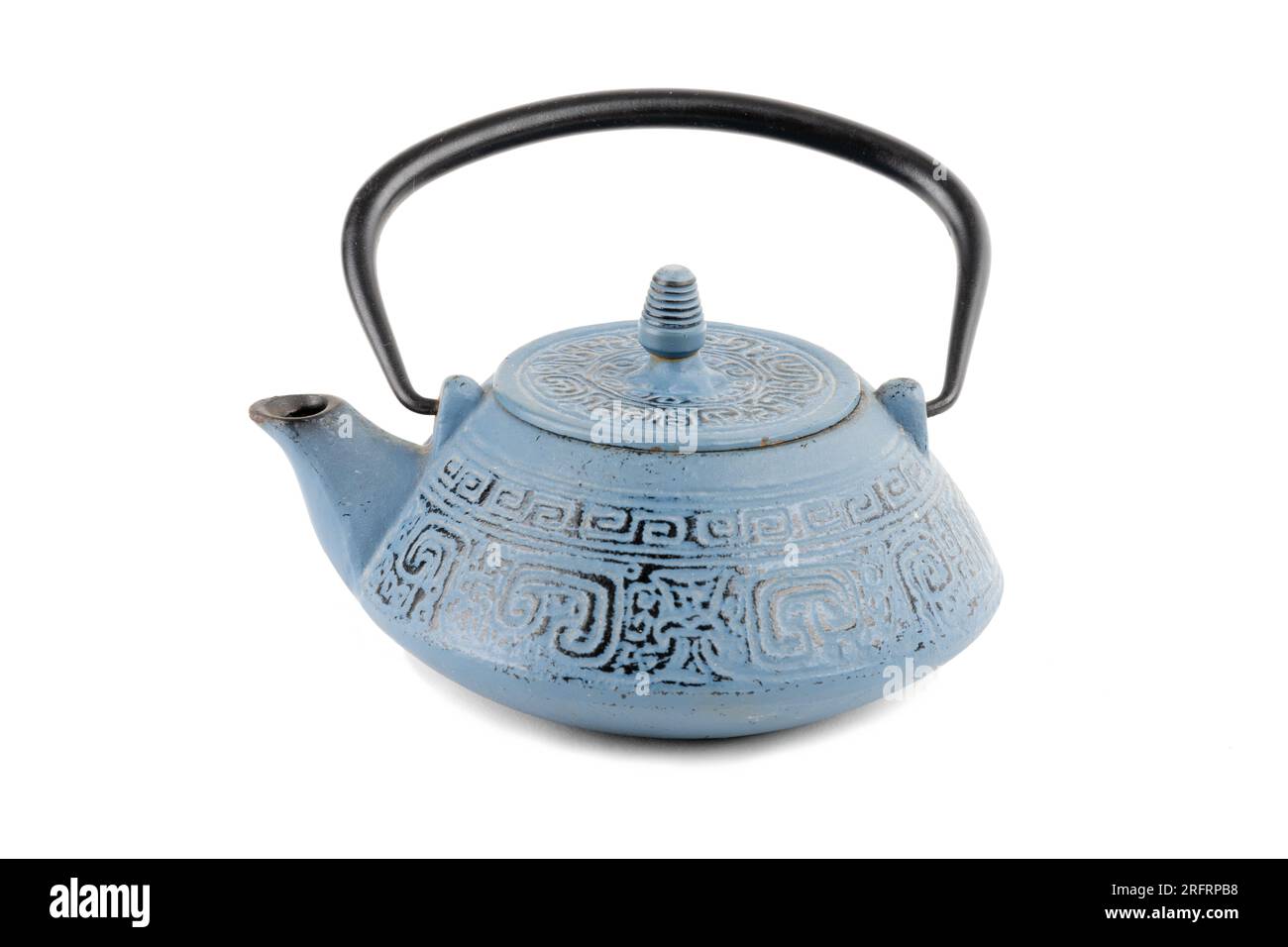 Not new blue iron teapot with blotches of rust Stock Photo Alamy
