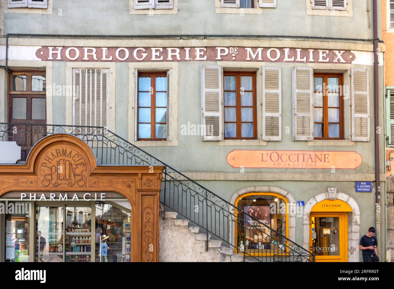 Old Annecy pharmacy and shop signs, Rue Jean-Jacques Rousseau, Vieille Ville, Annecy, Haute-Savoie, Auvergne-Rhône-Alpes, France Stock Photo