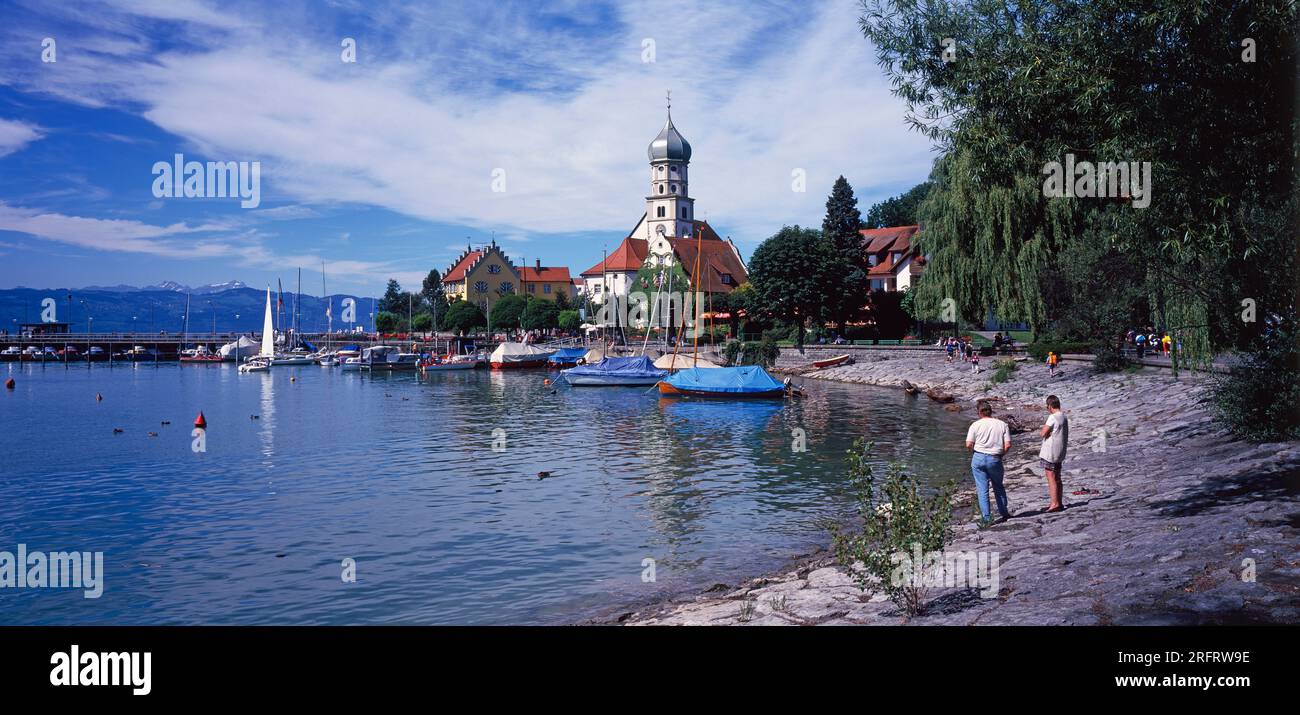 Germany. Wasserburg am Bodensee. Lake Constance shore with people. Stock Photo