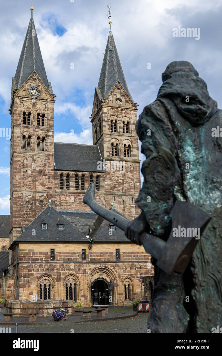 Saint Peter's Church with statue of St Boniface in town Fritzlar, Hesse, Germany Stock Photo