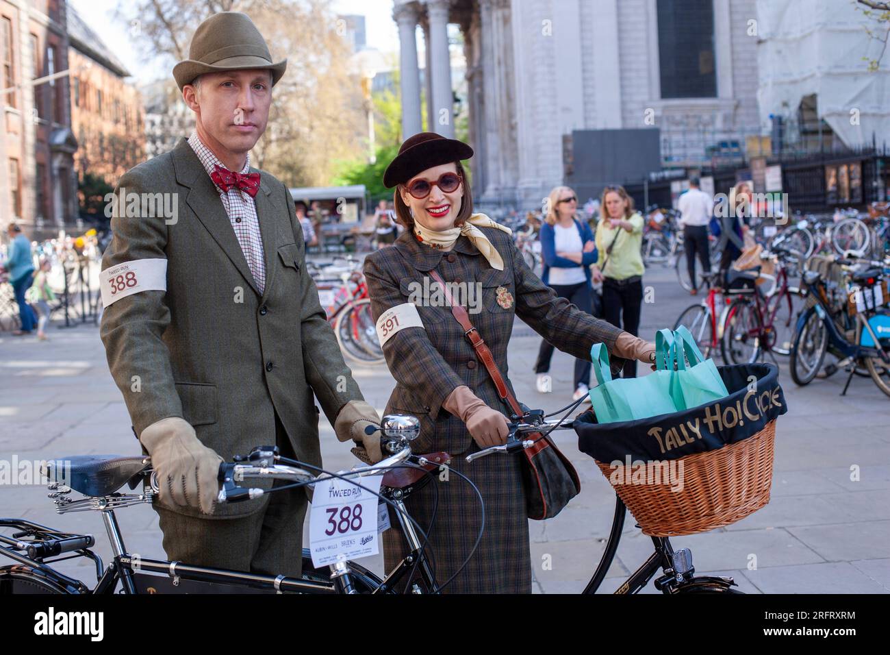 American couple attending the Tweed Run with retro bikes and vintage outfit in London, 2019 , UK Stock Photo
