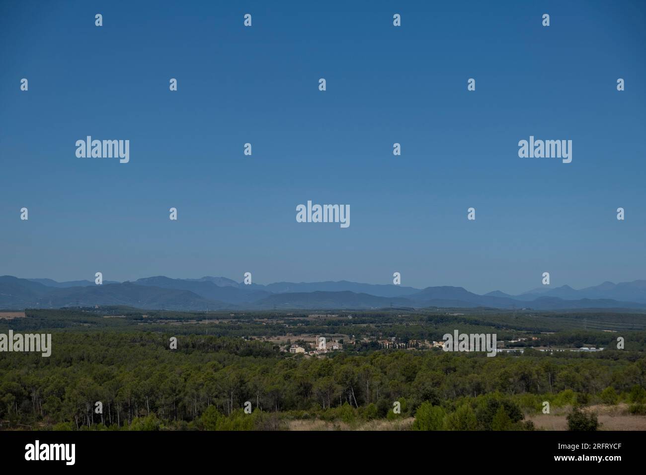 Girona, Spain. 05th Aug, 2023. The small town of Saus, Girona is seen among the forest mass from the Valldaviá viewpoint. 42 Catalan municipalities are at level 3 of high fire risk according to the Alpha Plan of the Generalitat of Catalonia. (Photo by Paco Freire/SOPA Images/Sipa USA) Credit: Sipa US/Alamy Live News Stock Photo