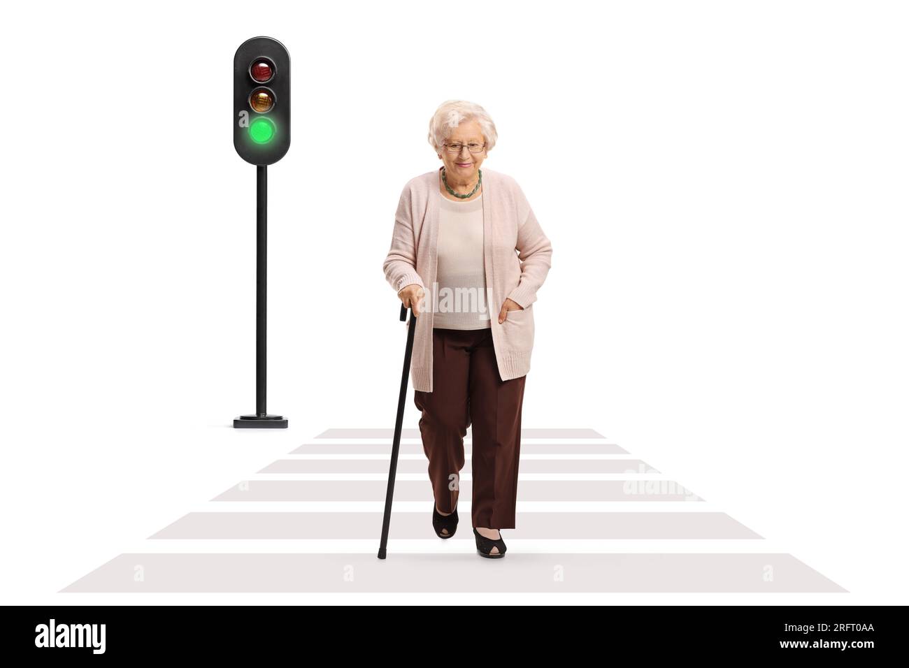 Full length portrait of an elderly lady crossing a street with a