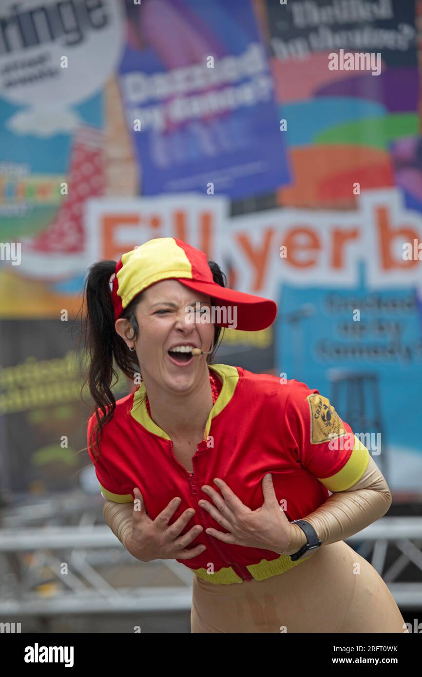 Edinburgh Festival Fringe, Scotland, UK. 5 August 2023. Slow start for audiences on the Royal Mile for audiences  on this first Saturday but crowds began to filter through mid  afternoon, when a heavy down pour for around half an hour  occurred. Street Performers kept most of the people watching  their show. Pictured: Gracie B Street performer from Australia. Credit: Archwhite/alamy live news. Stock Photo