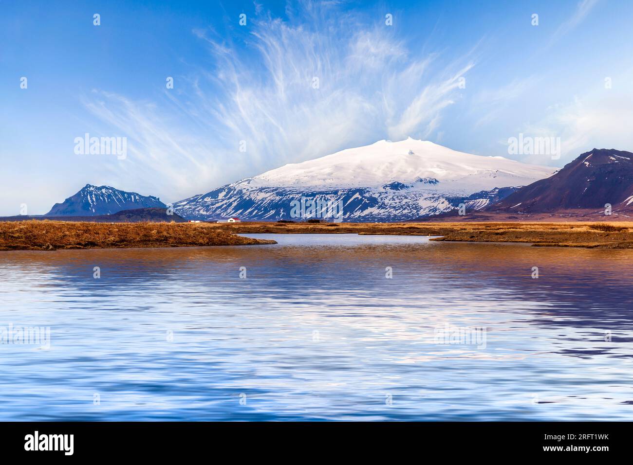 Snaefellsjokull, snow covered volcano on the Snaefellsnes Peninsula, West Iceland. Reflection is added. Stock Photo