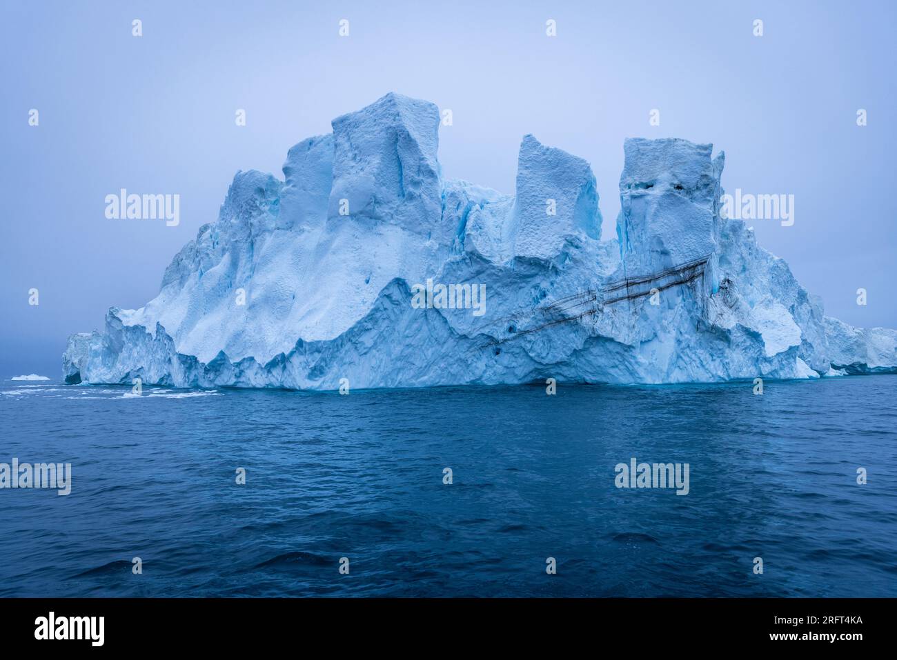 Giant icebergs in Disko Bay north of Arctic Circle, near Ilulissat Icefjord, Greenland Stock Photo