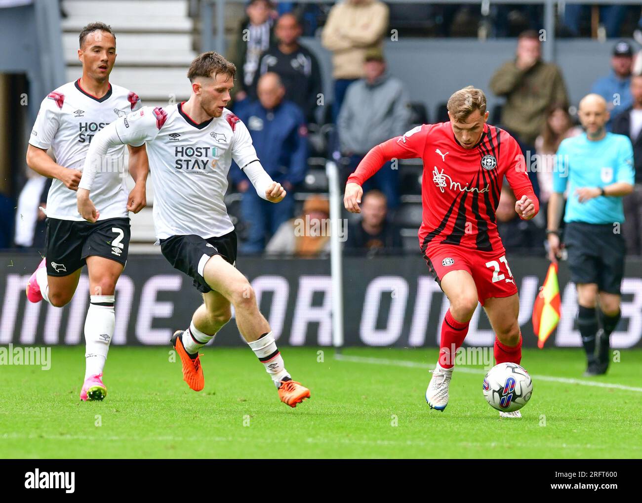 Derby, UK. 05th Aug, 2023. Scott SMITH (Wigan Athletic) on the ball chased by Max BIRD (Derby County) during the EFL Sky Bet League 1 match between Derby County and Wigan Athletic at the Pride Park Stadium, Derby, England on 5 August 2023. Photo by Mark Dunn. Editorial use only, license required for commercial use. No use in betting, games or a single club/league/player publications. Credit: UK Sports Pics Ltd/Alamy Live News Stock Photo