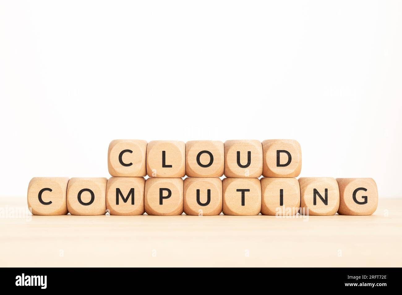 Cloud Computing phrase on wooden blocks. Copy space Stock Photo