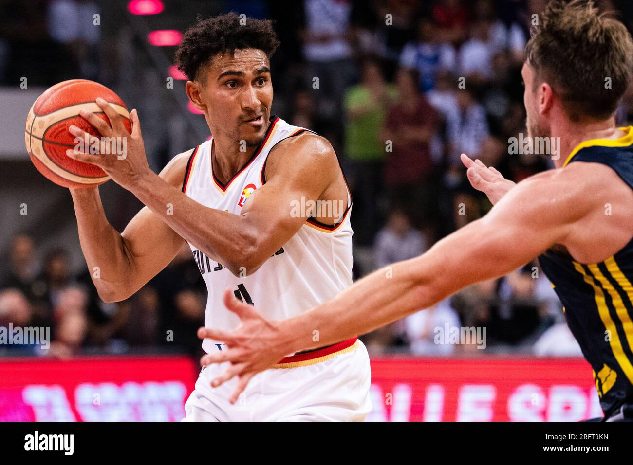 Bonn, Germany. 05th Aug, 2023. Basketball: International match, Germany - Sweden, Telekom Dome. Sweden's David Höök (right) tries to prevent Germany's Maodo Lo from taking a shot. Credit: Marius Becker/dpa/Alamy Live News Stock Photo
