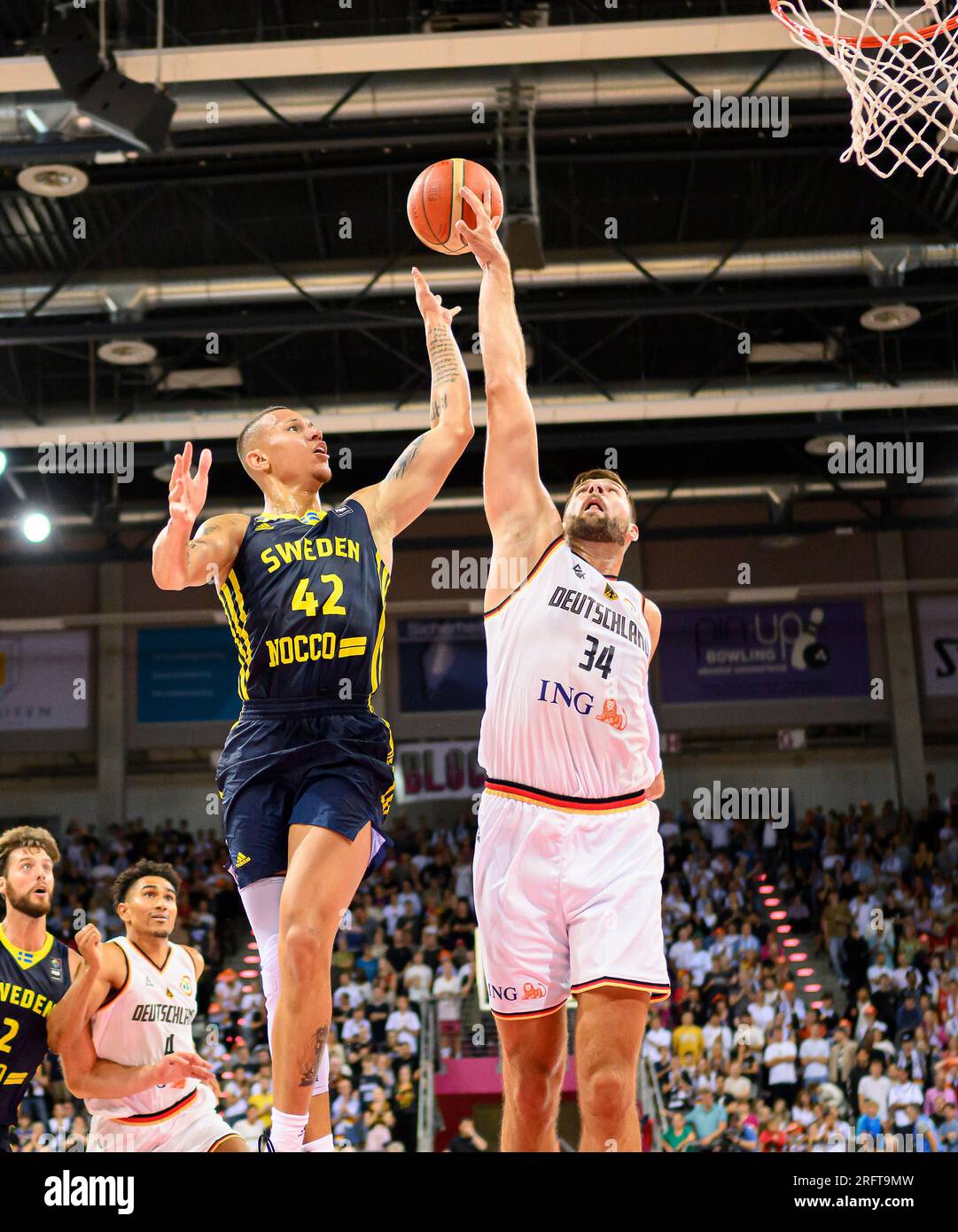 Left to right elijah clarance swe leon kratzer ger action duels block basketball laenderspiel test match germany sweden on au Left to right elijah clarance swe leon kratzer ger action duels block basketball laenderspiel test match germany sweden on au