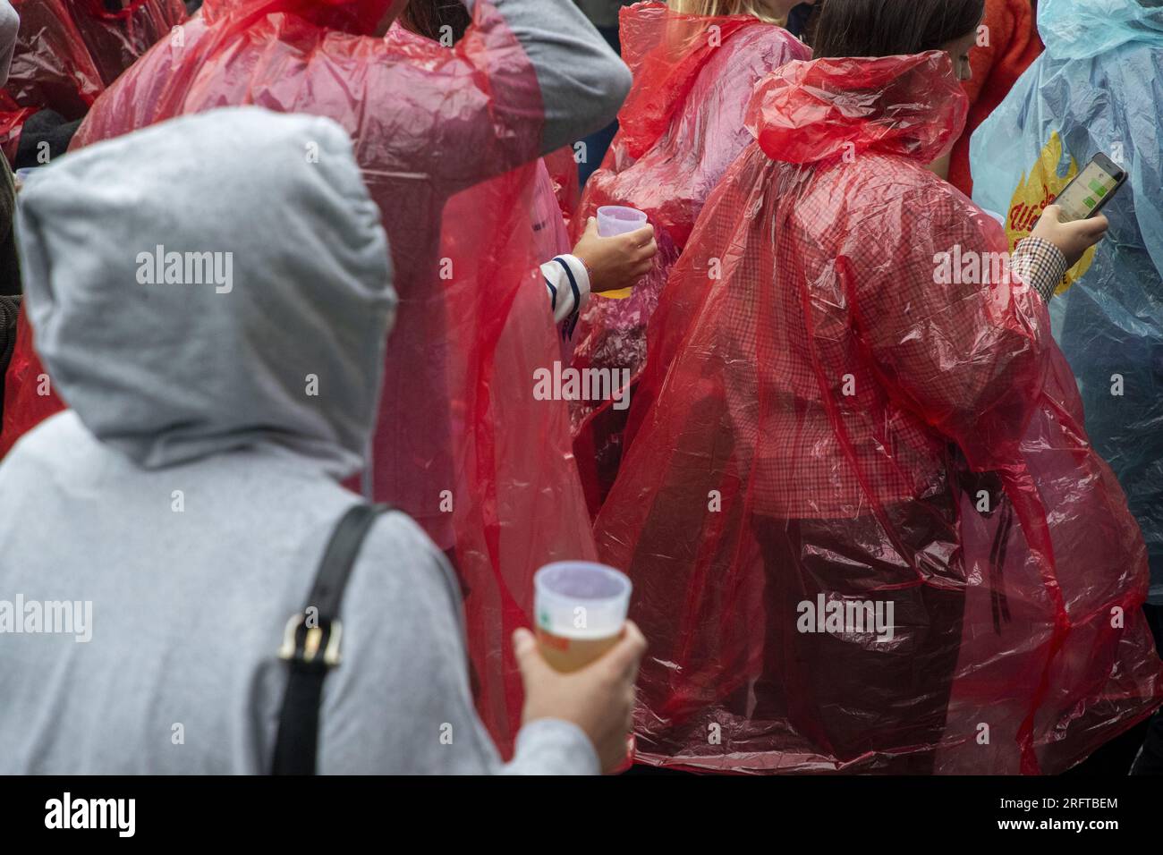 Rain poncho festival hi-res stock photography and images - Page 3 - Alamy