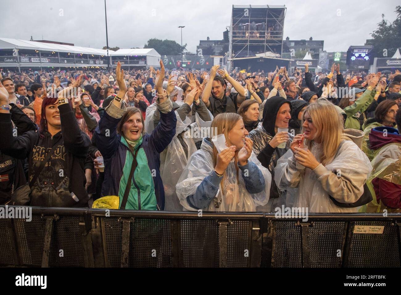 Rain poncho festival hi-res stock photography and images - Page 2 - Alamy
