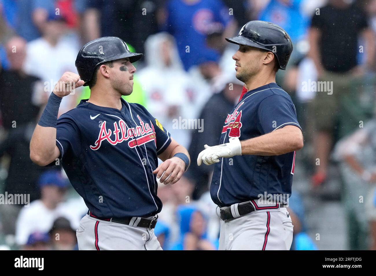 Atlanta Braves' Austin Riley (27) celebrates with Matt Olson after