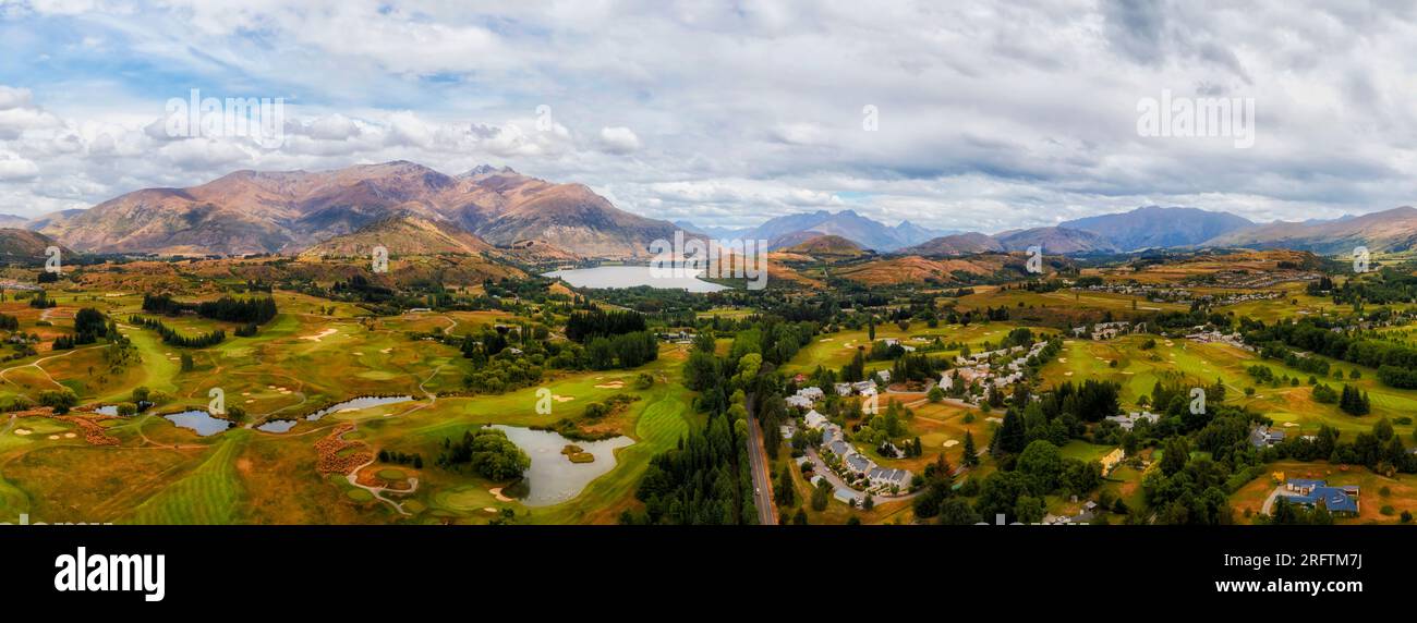 HIstoric arrowtown town in scenic vale of New Zealand South Island at Lake Hayes near QUeenstown- short aerial panorama. Stock Photo