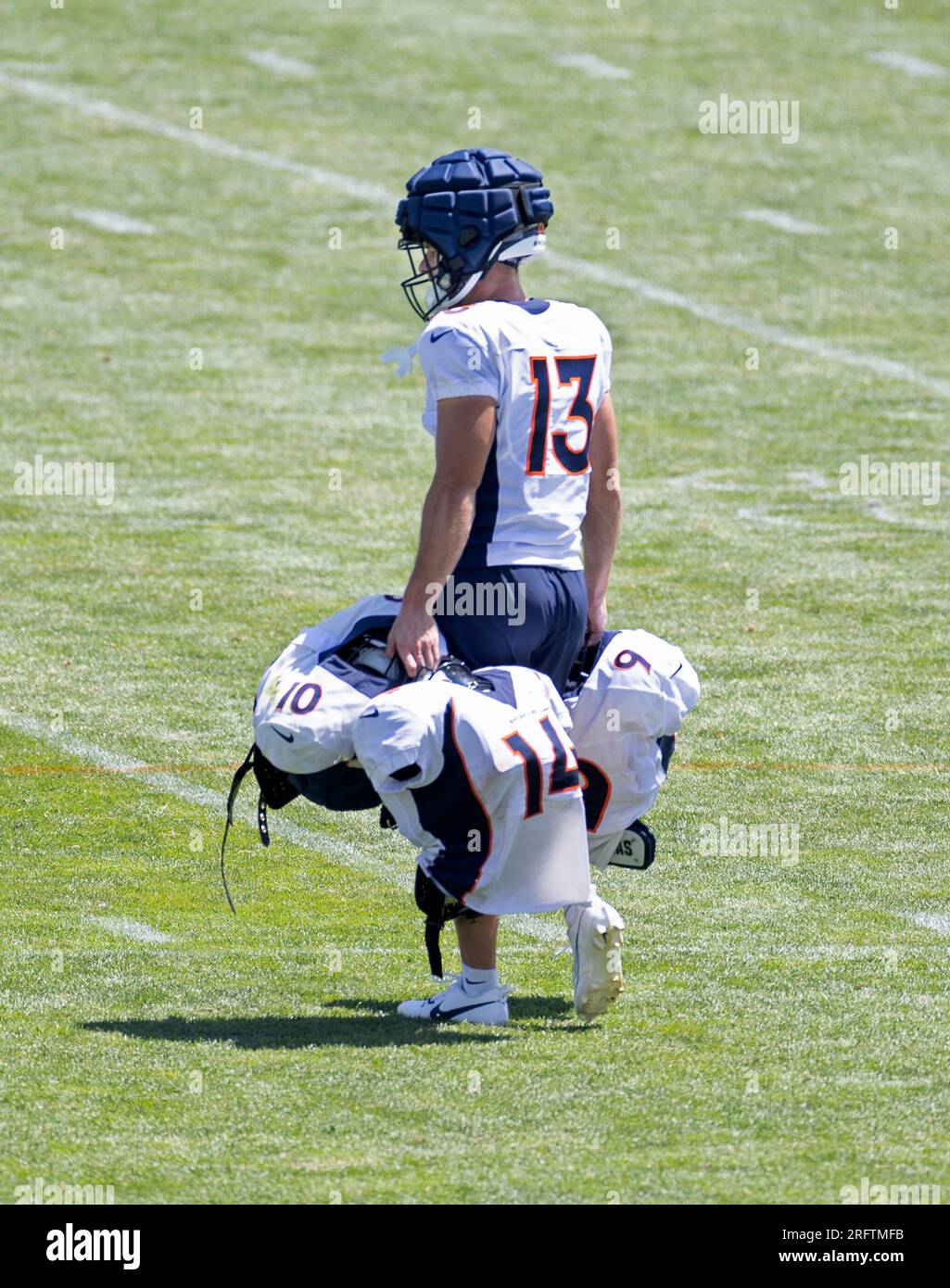 Englewood, Colorado, USA. 5th Aug, 2023. Broncos WR TAYLOR GRIMES picks up  his team mates gear after practice Saturday morning at Centura Health  Training Center. (Credit Image: © Hector Acevedo/ZUMA Press Wire)