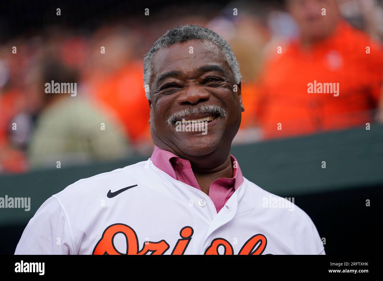 Former Baltimore Orioles player Eddie Murray looks on from the dugout  during a pre-game celebration honoring the 1983 World Series championship  team prior to a baseball game against the New York Mets