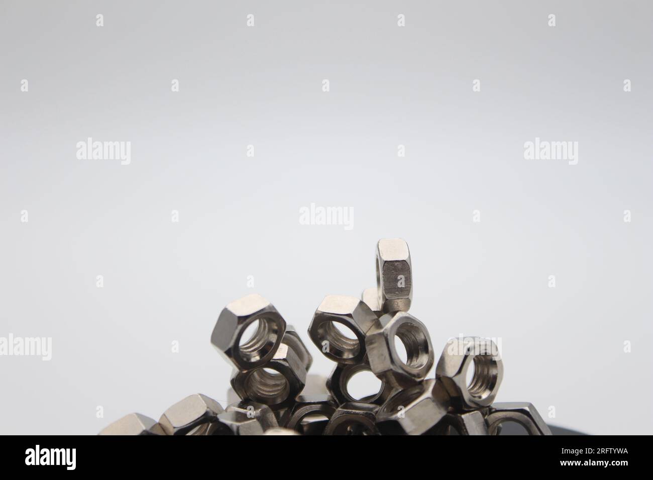 Many nuts touching each other with white background and text area Stock Photo