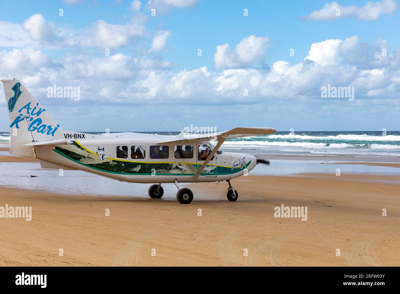 Fraser Island and 75 mile beach, K'gari light aircraft plane prepares to take off for tourist flight,Queensland, Australia Stock Photo