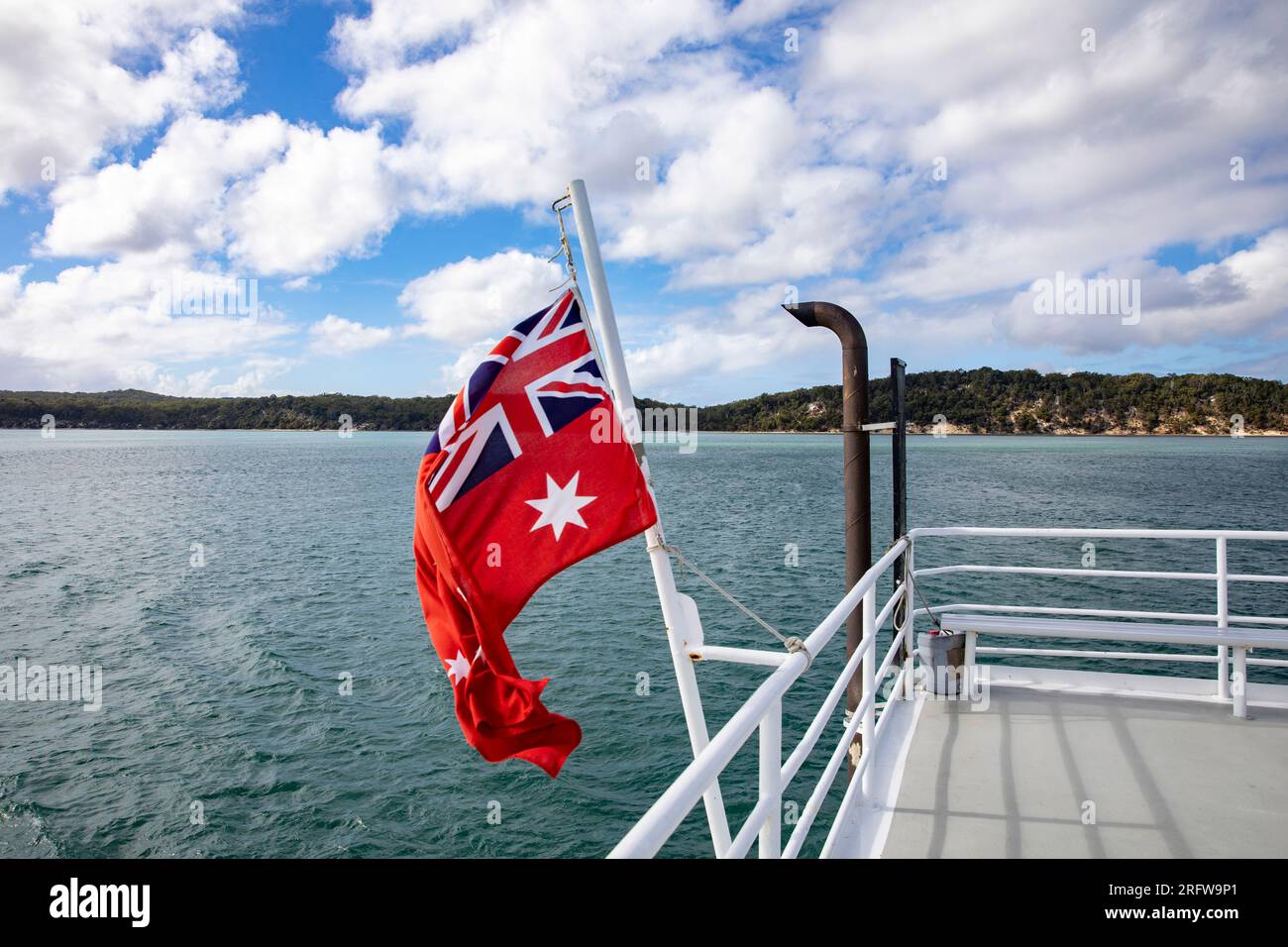 Sealink ferry boat to Fraser Island in Queensland, ferry flys red