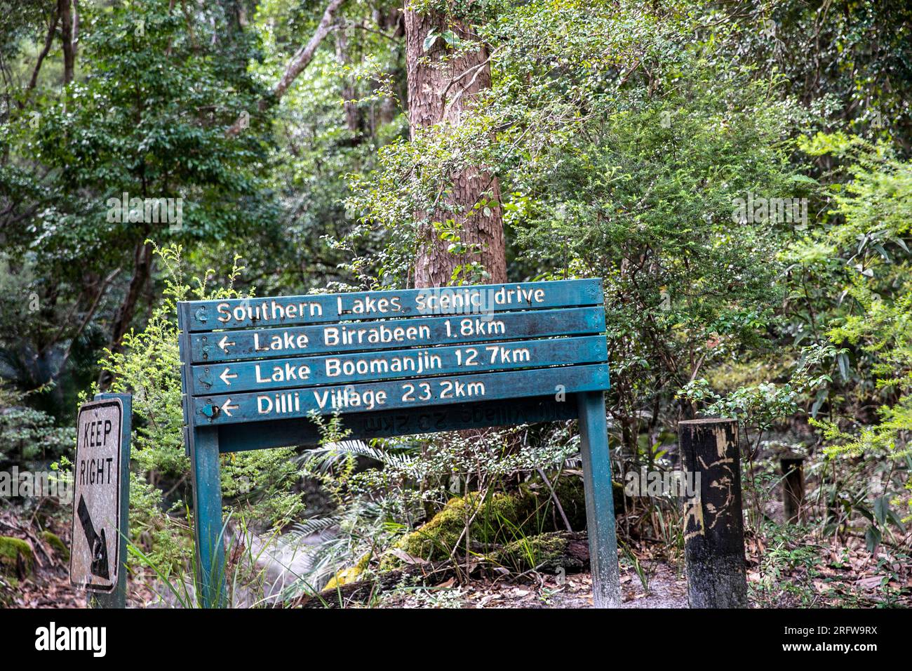 Fraser Island K'gari timber sign for directions to lakes on southern