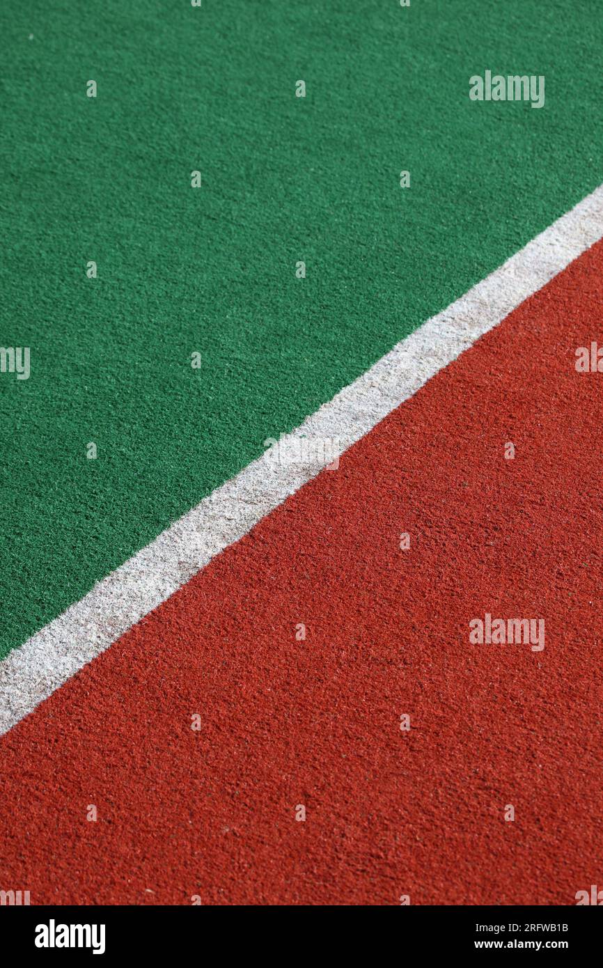 The sideline of a synthetic sporting field, specifically a Hockey field. Stock Photo