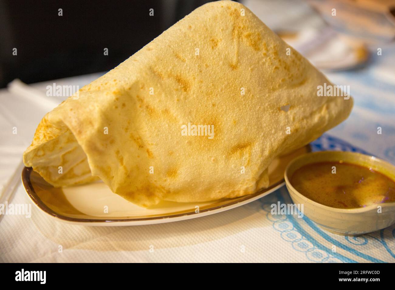 Flat and folded Roti Canai as an appetizer Stock Photo