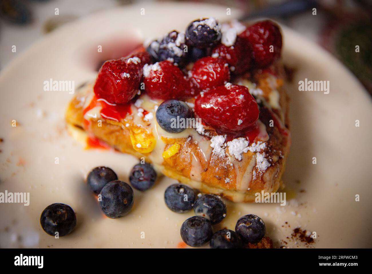 Stuffed French Toast with Berries with powdered Sugar Stock Photo