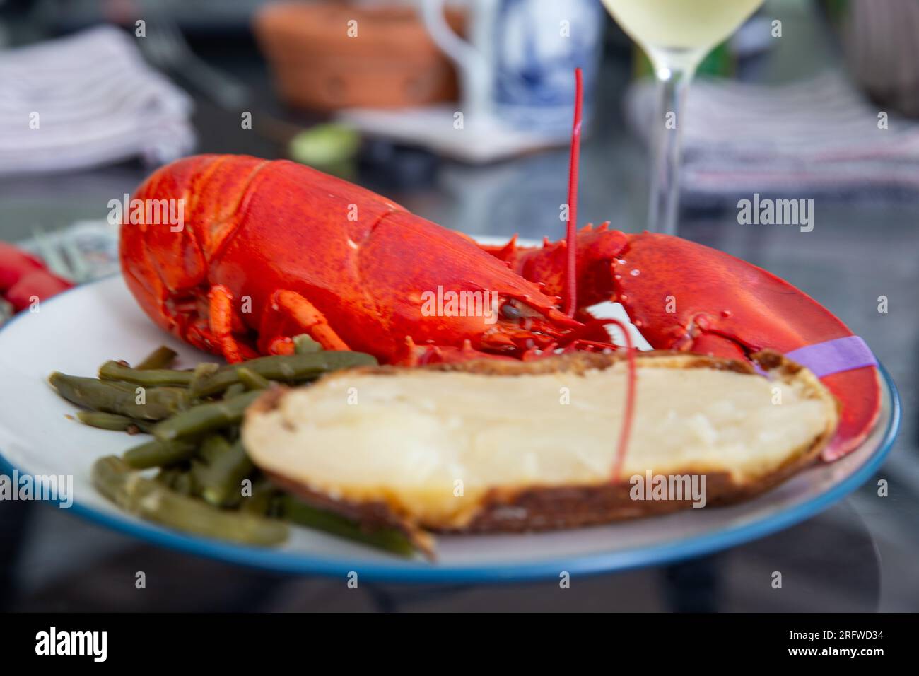 Maine lobster dinner with veggies and carbs Stock Photo Alamy