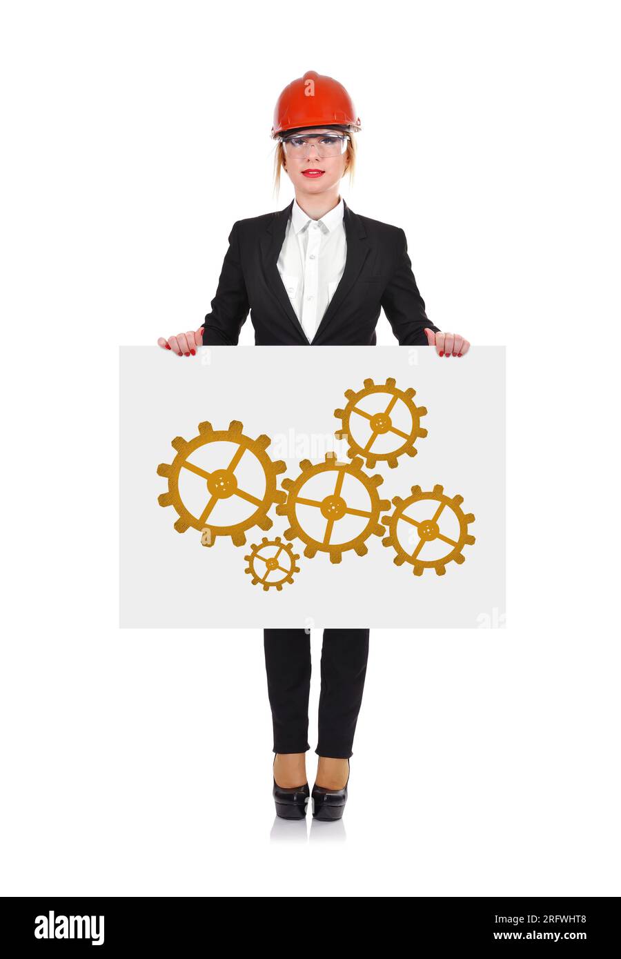 Engineer woman holding paper with cogs and wheels Stock Photo