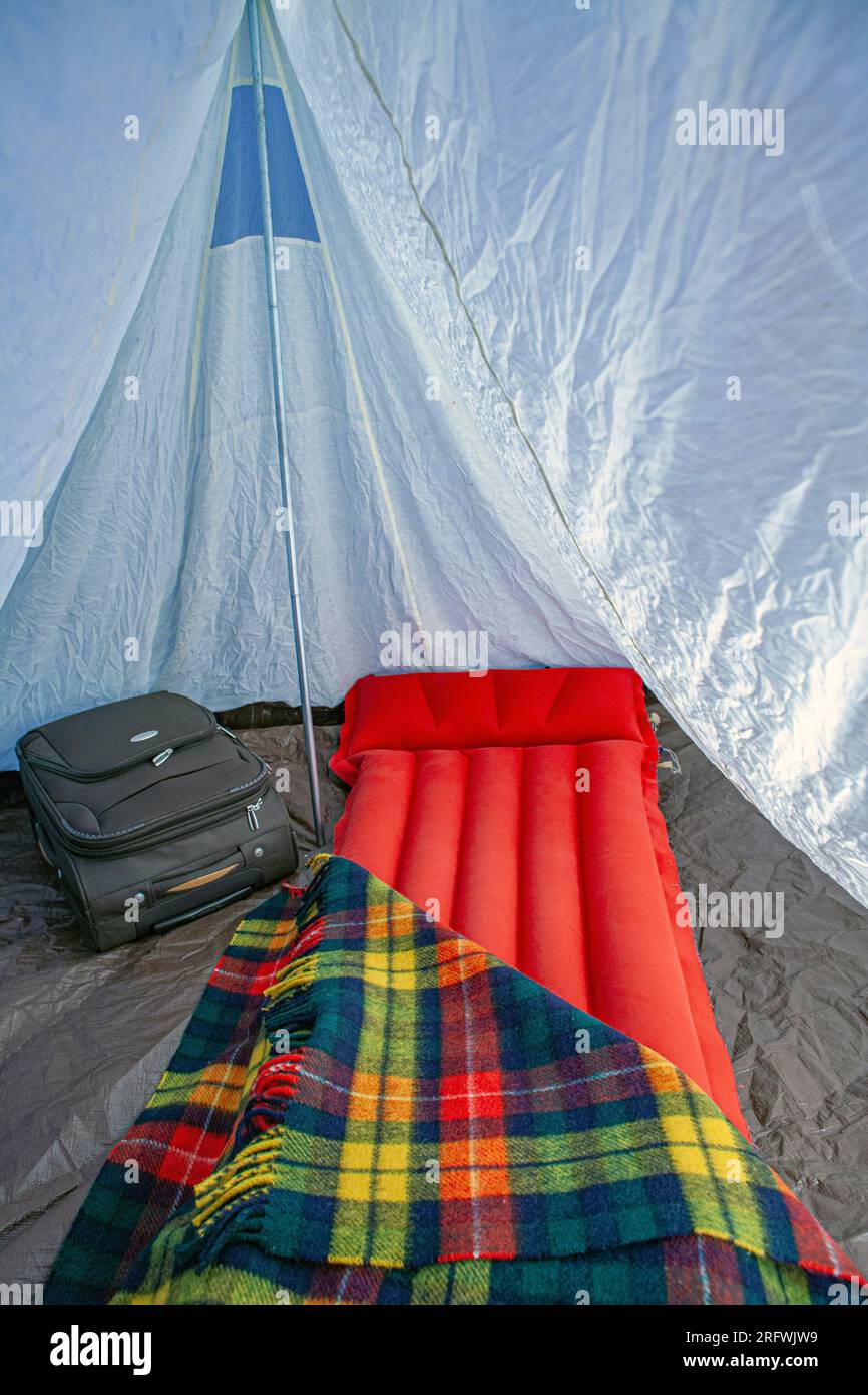 air mattress inside tent at campground. Stock Photo
