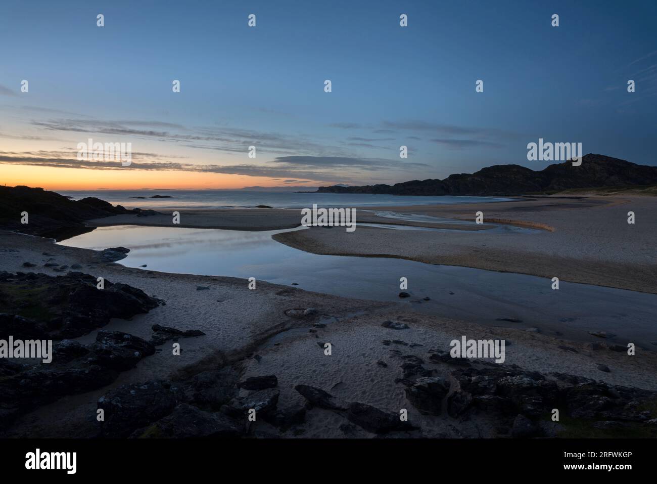 Last light, Kiloran Bay, Colonsay, Scotland Stock Photo