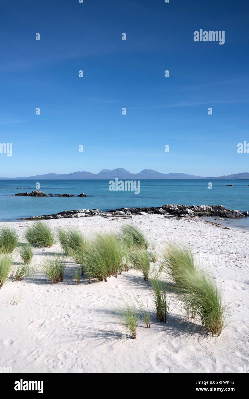 View across to the Paps of Jura from the Strand on Colonsay, Scotland Stock Photo