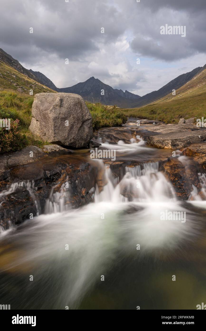 Glen Rosa waterfalls with the peak of Cir Mhor in the distance, Isle of Arran, Scotland Stock Photo