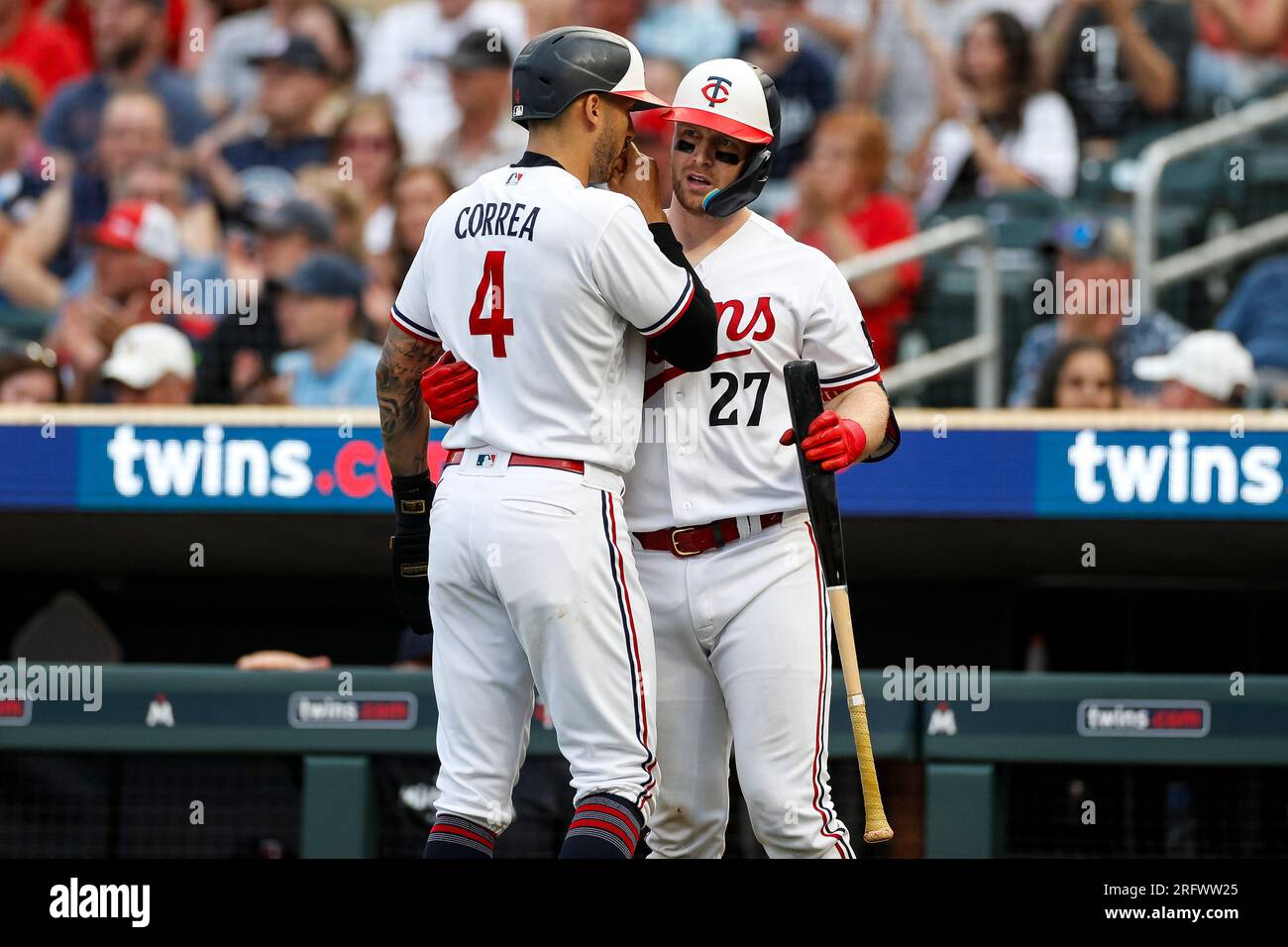 Minnesota Twins shortstop Carlos Correa (4) talks with catcher Ryan ...