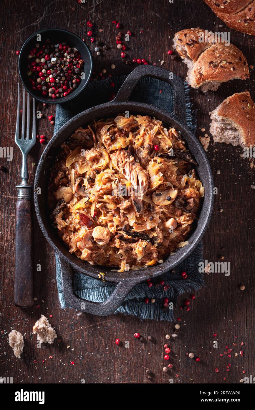 Hot and spicy stew with sauerkraut, cabbage and spices. Bigos is traditional Polish food. Stock Photo