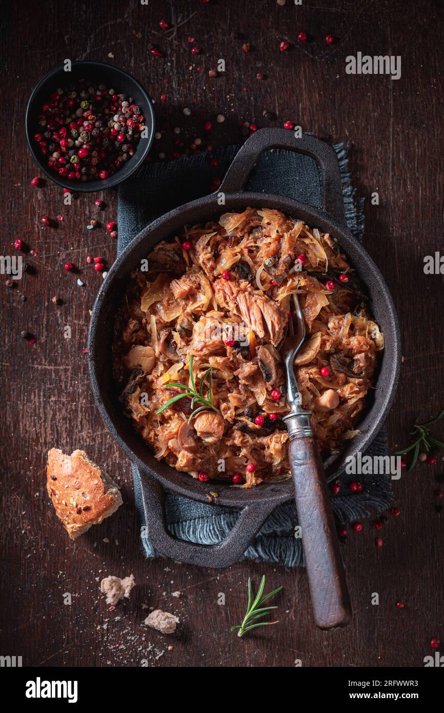 Tasty and spicy stew made of beef and sauerkraut. Bigos is traditional Polish food. Stock Photo