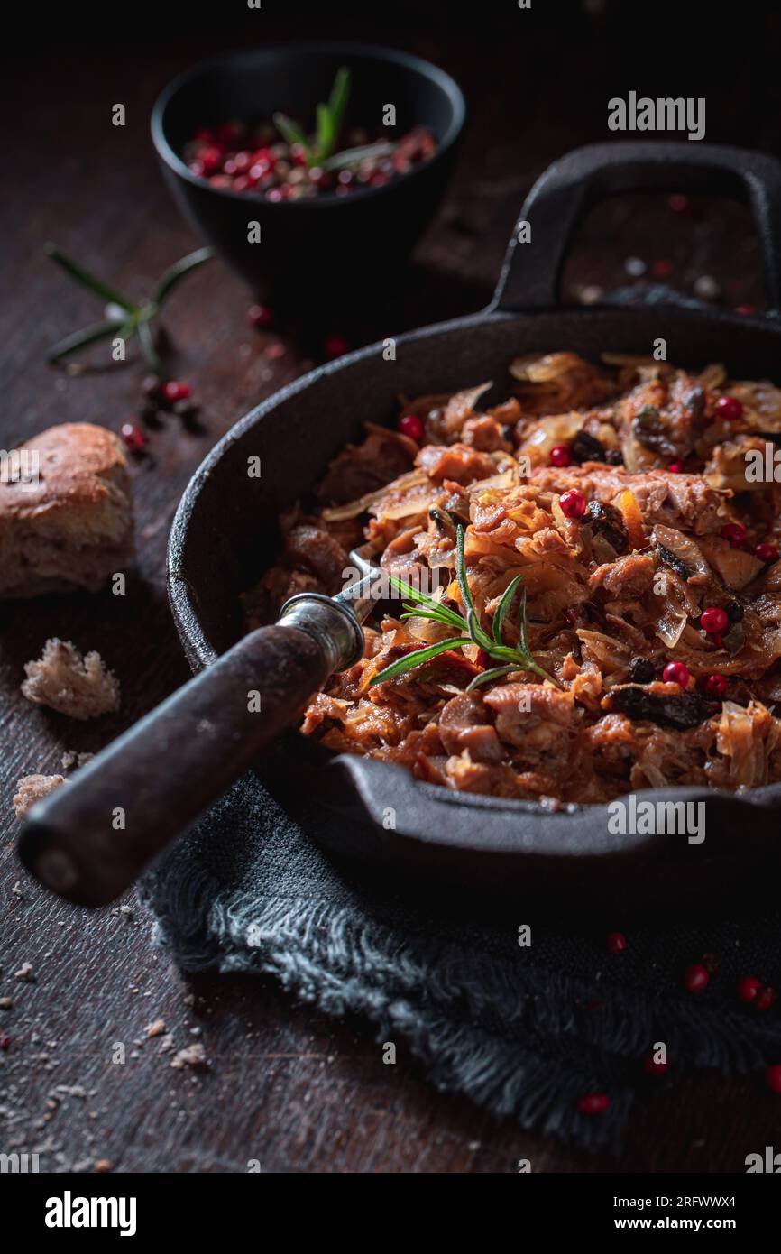 Tasty and spicy stew made of cabbage and beef. Bigos is traditional Polish food. Stock Photo