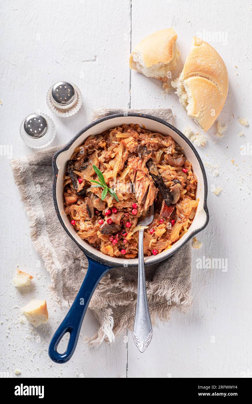 Spicy and homemade stew made of cabbage and beef. Bigos is traditional Polish food. Stock Photo